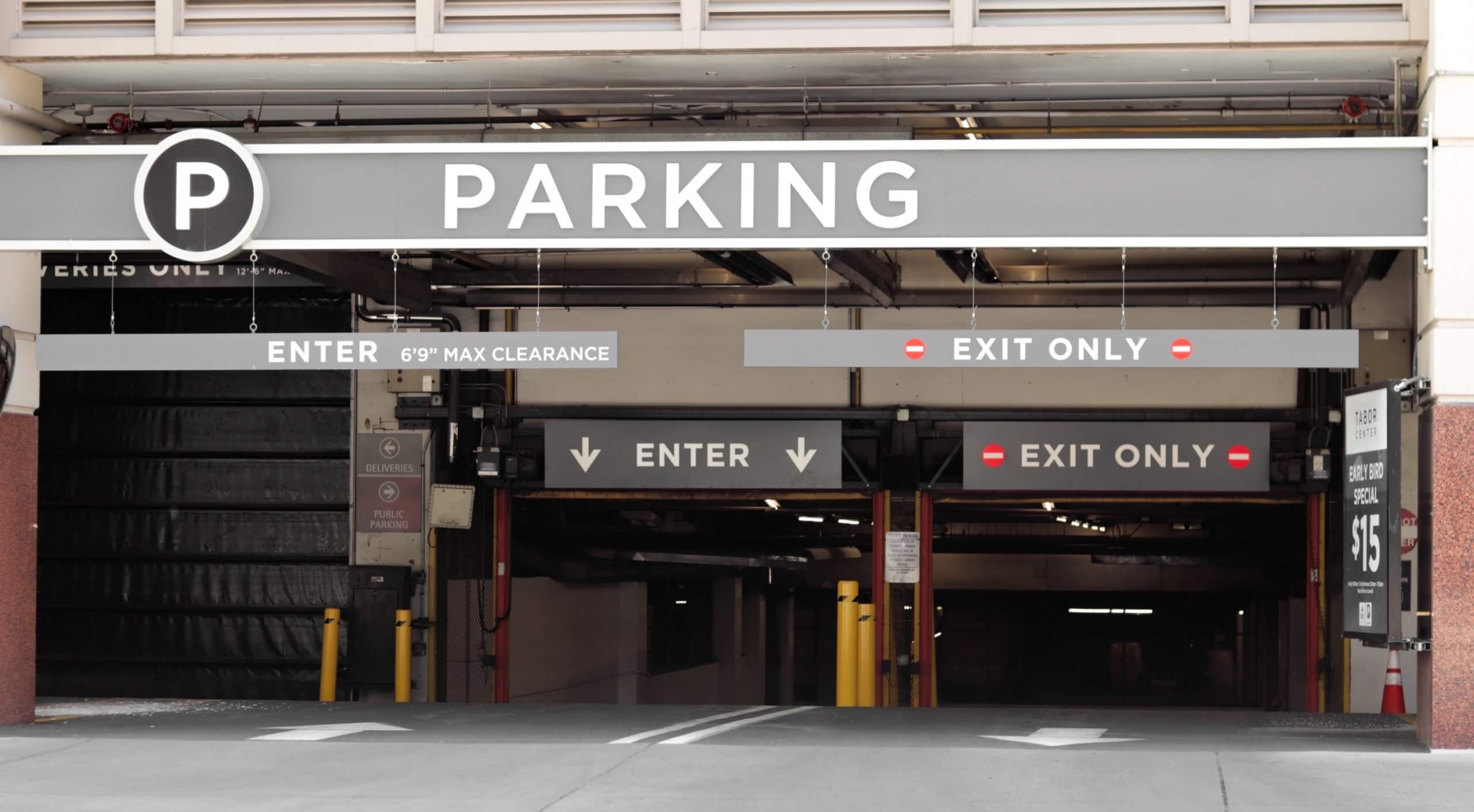 city building parking lot traffic downtown parking garage parking signage garage street photography t20 N08NWQ scaled
